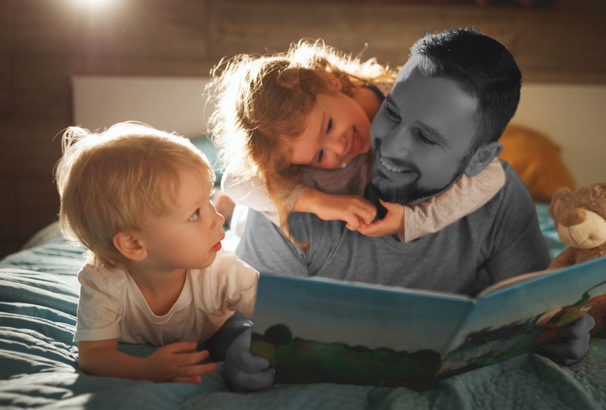 Dad reads with his children