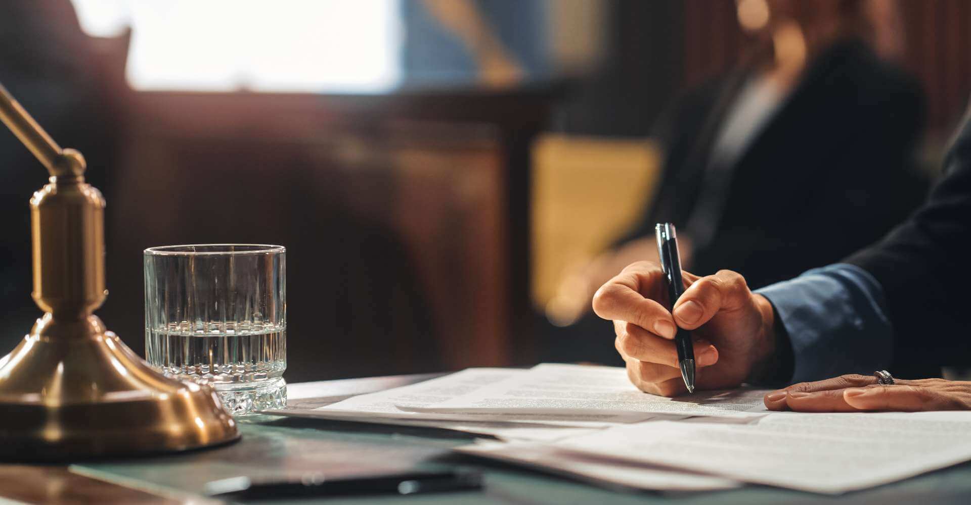 Lawyer writing on paper