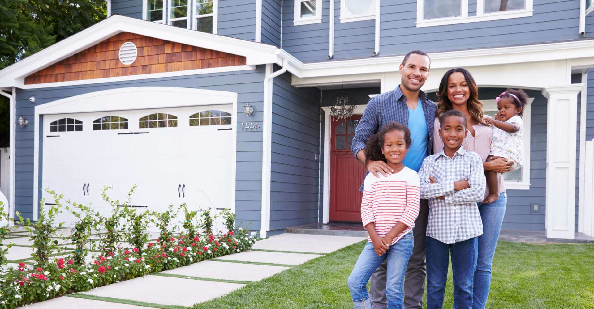 Family stood outside their house